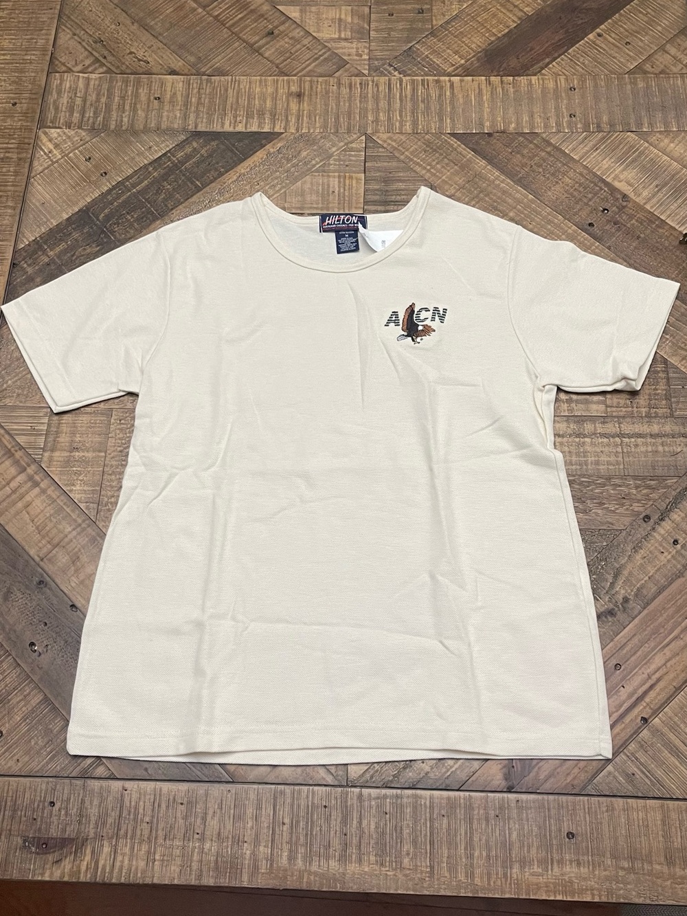 vintage cream-colored Hilton graphic t-shirt